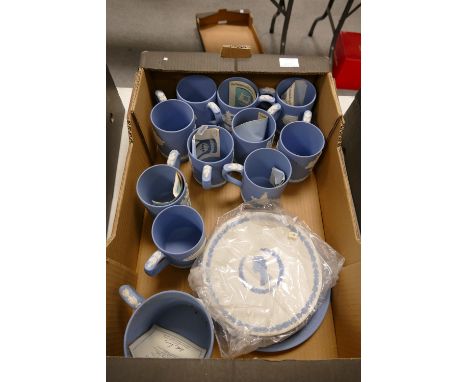 A collection of various Wedgwood light blue jasper ware items including mugs, plates, two handled Royal commemorative loving 