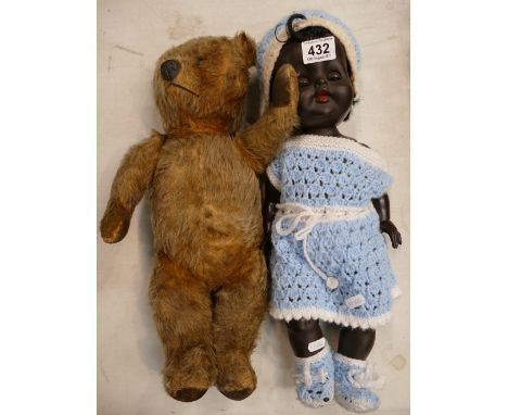 Large straw filled teddy bear with felt pads together with large Ruberoid doll 