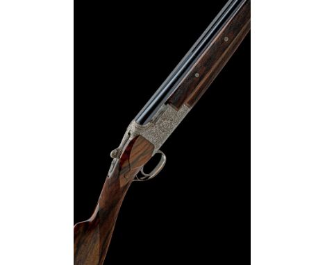 FABRIQUE NATIONALE A LEUNEN-ENGRAVED 12-BORE 'D5G-TYPE' SINGLE-TRIGGER OVER AND UNDER EJECTOR, serial no. 24385S3, for 1963, 