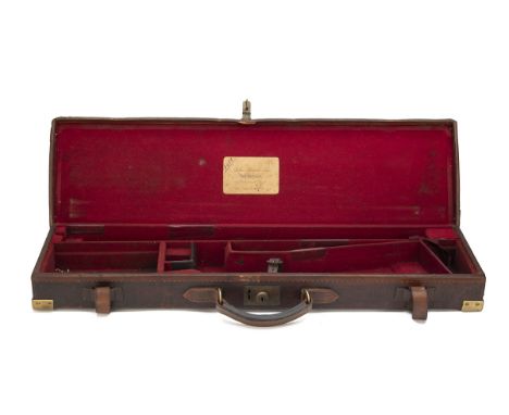 JOHN BLANCH &amp; SON A BRASS-CORNERED SINGLE LEATHER GUNCASE (FOR GUN NO. 6488) fitted for 28in. or 30in. barrels, the inter