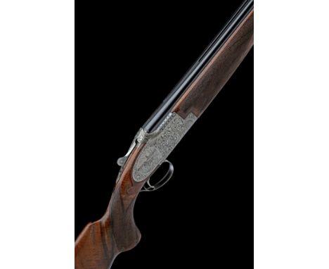 FABRIQUE NATIONALE 'CUSTOM FINISHED BY G.M. CRUXTON' A 12-BORE SIDEPLATED 'B25' SINGLE-TRIGGER OVER AND UNDER EJECTOR, serial