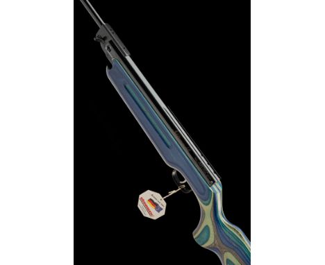 A LIMITED EDITION .22 WEIHRAUCH HW35 'K' 'JUBILAUMSMODELL' BREAK-BARREL AIR RIFLE WITH BLUE/GREY LAMINATED STOCK, serial no. 