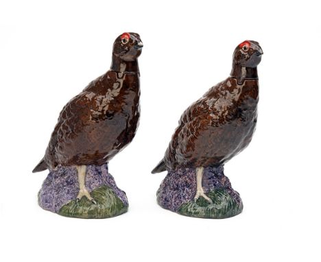 ROYAL DOULTON (BESWICK) A BRACE OF 'THE FAMOUS GROUSE' WHISKY DECANTERS, standing approx. 9 1/4in. tall.