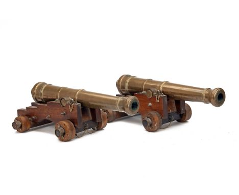 A PAIR OF 6-BORE BRONZE-BARRELLED MINIATURE NAVAL CANNON, UNSIGNED, no visible serial numbers, early 20th century, with taper