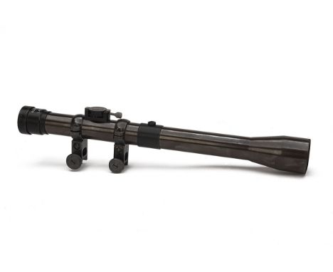 ALDIS A VINTAGE TELESCOPIC SIGHT, with blued steel 13in. body of 1in. diameter, flared objective lens bell, brass ocular lens