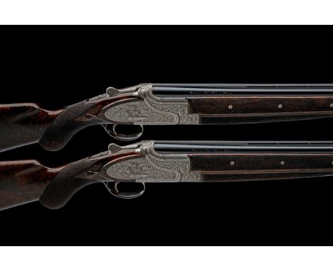 BROWNING A PAIR OF DERWA-ENGRAVED 12-BORE 'MOD. B25 E1' SINGLE-TRIGGER SIDEPLATED OVER AND UNDER EJECTORS, serial no. 325MT04