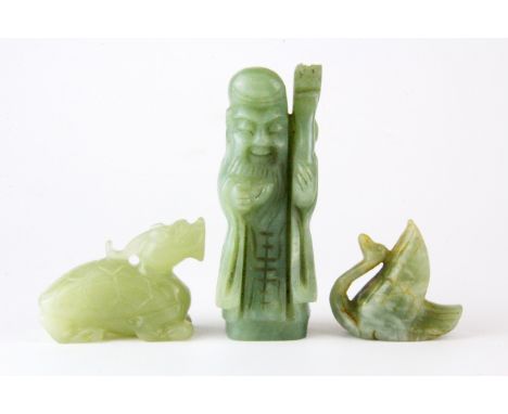 A group of three Chinese carved nephrite jade figures, tallest H. 10cm.