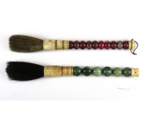 Two Chinese bone and stone bead calligraphy brushes, L. 32cm.