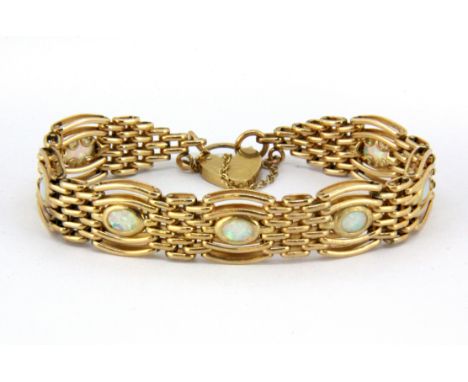 A 9ct yellow gold opal set bracelet.