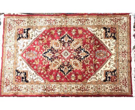 A large Eastern hand woven wool carpet, size 266 x 368cm.