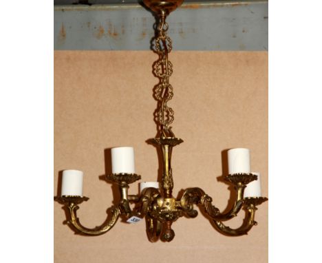 A five branch brass light fitting, H. 56cm.