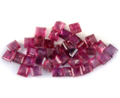 A quantity of unmounted step cut untreated rubies, approx. 3ct overall, 2mm.