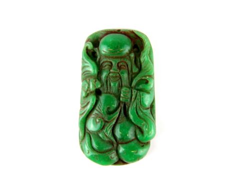 A Chinese carved dark jade/ hardstone amulet of Shou Lao, H. 7.5cm.