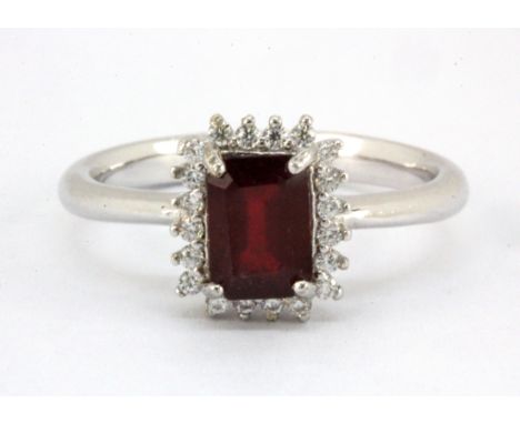 A 925 silver emerald cut ruby and white stone set cluster ring, (N.5).