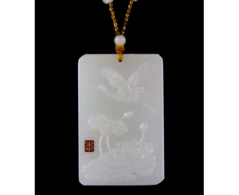 A Chinese white jade/ hardstone bead necklace, pendant, size 6 x 3.5cm.