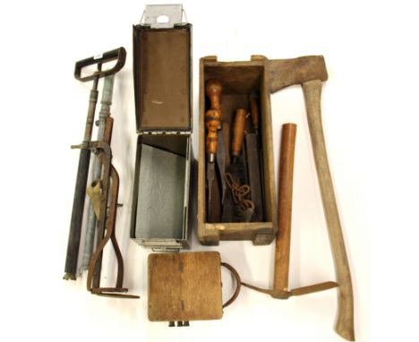 Two World War II hand operated water pumps and other tools and items.