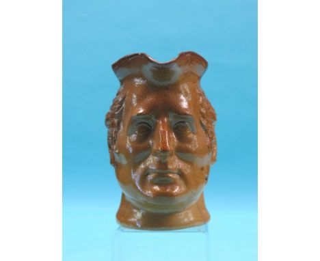A Stephen Green, Lambeth salt-glazed stoneware portrait jug, Duke of Wellington, 1820's, moulded wreath mark, 7.5in. SEE ILLU