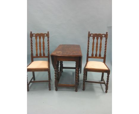 A solid, dark oak gateleg dining table, on barley-twist underframe, 3ft. 5in., and a set of four similar dining chairs, with 