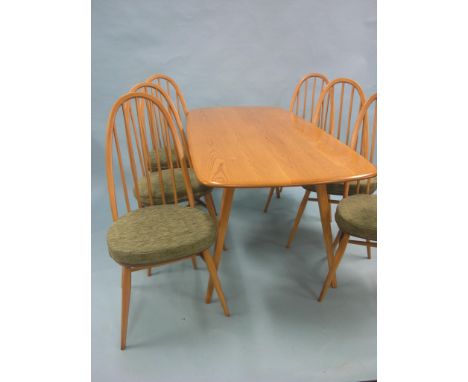 An Ercol light elm dining room set, table, 5ft., set of six stick-back chairs with squab cushions, near-excellent 