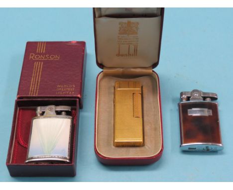 An enamelled Sterling silver Ronson cigarette lighter, in original box, and two other cigarette lighters 