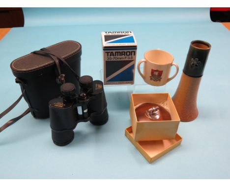 A German pair of binoculars, in case, Tamron Macro Compact Zoom lens, Ronson table lighter, both boxed, Goss crested china ty