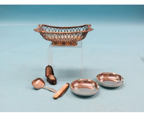 A George III engraved silver caddy spoon, Birmingham 1816, folding fruit knife with silver blade, plated thimble in leather c