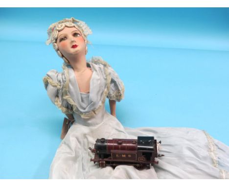 A Hornby gauge O electric tank locomotive, No. 70, pre-war, together with a Lenci-type cloth doll, painted composition limbs 