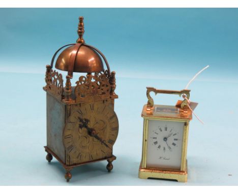 A small brass lantern clock, Buren spring-driven movement, 10.5in., and a brass carriage clock, enamelled dial and timepiece 