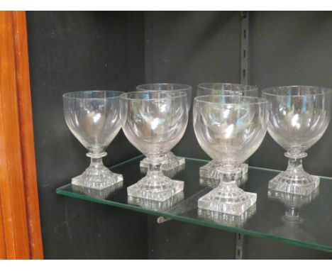 A set of six early 19th century glass rummers, ovoid bowls and 'lemon squeezer' bases, circa 1830