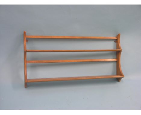 An Ercol light elm twin-shelf wall unit, 3ft. 2in. - near excellent