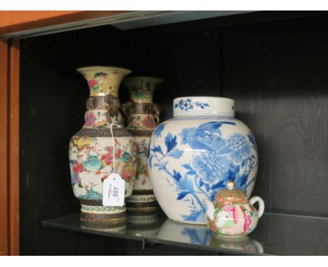 A Chinese porcelain ginger jar, with cover, painted in underglaze blue, 8in., a pair of enamelled porcelain vases with mask r