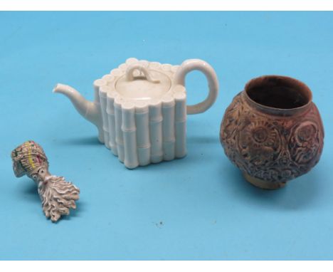A 19th century French clay pipe-bowl, "Jacob", with novelty bearded portrait bowl, together with a Belleek first period novel
