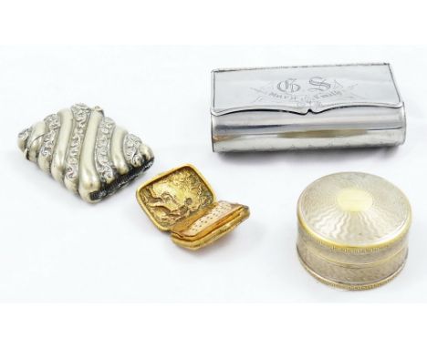 An early 19th century gilt metal vinaigrette, embossed and chased with a shepherd and shepherdess, opening to reveal a pierce