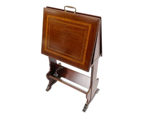 An Edwardian mahogany patent action folio stand/book rack, with satinwood inlay, the triangular shaped top with two inverted 