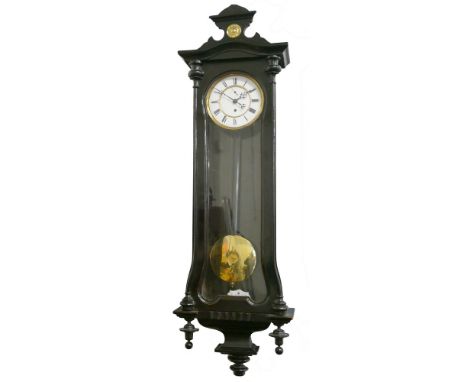 A Vienna style wall clock, the white enamel two part dial with Roman numerals and subsidiary seconds dial, the single train m