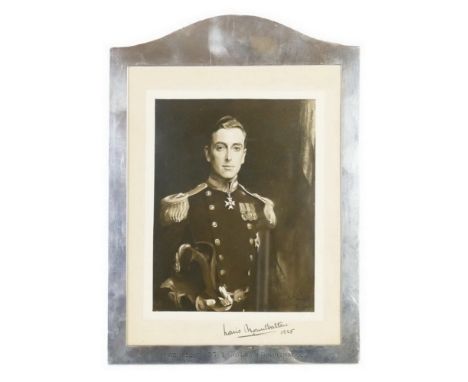 Of Louis Mountbatten interest - a silver photograph frame, London 1924, of arched rectangular form, inscribed "Presented to S