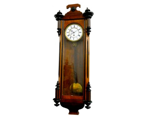 A late 19th century Vienna style wall clock, the white enamel dial with Roman numerals, the single train movement numbered 65