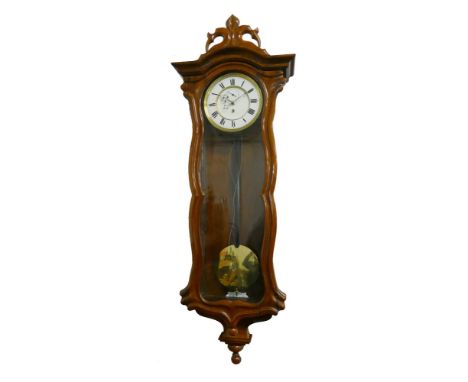 A Vienna style wall clock, the white enamel two part dial with Roman numerals and subsidiary seconds dial, the single train m