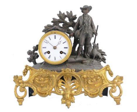 A 19th century French spelter and gilt figural mantle clock, the white enamel dial with Roman numerals, the eight day movemen