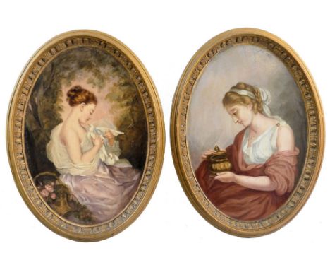 A pair of Danish terracotta oval wall plaques, inscribed verso 'Eneret P. Ipsen, Kjobenhavn 402' each painted with a study of