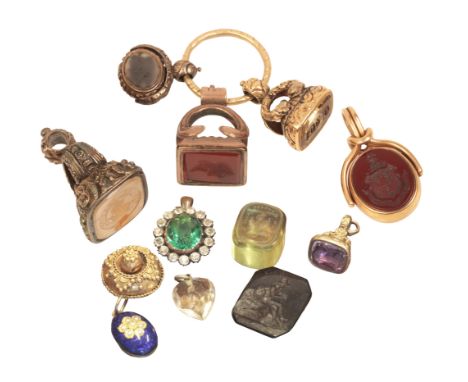 A COLLECTION OF ANTIQUE JEWELLERYincluding a split ring of gem-set fob seal pendants in chased gold; a bloodstone and carneli