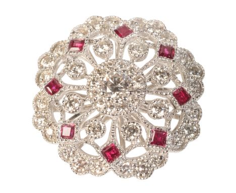 A RUBY AND DIAMOND COCKTAIL RINGin 14ct white gold, set throughout with round brilliant-cut diamonds and step-cut rubies over