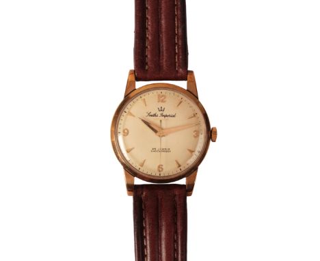 SMITHS IMPERIAL: A GENTLEMAN'S 9CT GOLD WRISTWATCHwith manual wind movement, the white dial with gold Arabic and baton numera