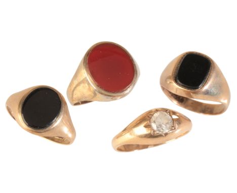FOUR SIGNET RINGSin 9ct gold, including two signet rings set with onyx and one signet set with carnelian; together with a gyp