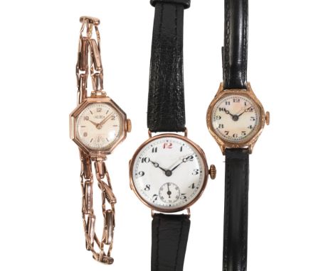 TREBEX: A LADY'S 9CT GOLD BRACELET WATCHwith manual wind movement, the white dial with subsidiary seconds dial, gold Arabic a