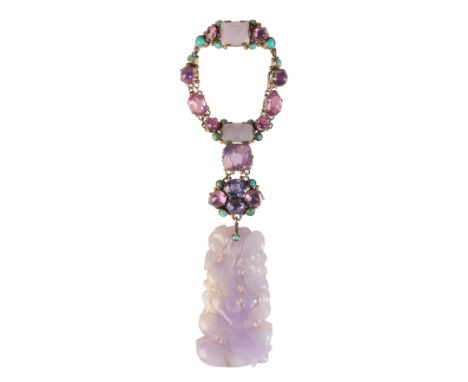 A JADE AND SAPPHIRE BROOCHin silver, set with articulated links set throughout with pink and purple sapphire cabochons, to a 