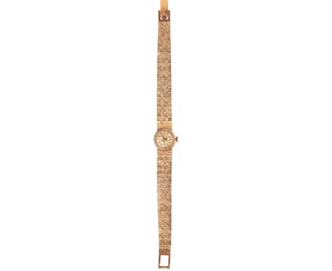 ROLEX: A LADY'S 14CT GOLD BRACELET WATCHwith manual wind movement, the gold dial with black and gold baton numerals and black