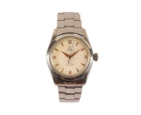 TUDOR OYSTER PRINCE: A GENTLEMAN'S STAINLESS STEEL BRACELET WATCHwith manual wind movement, the white dial with gold Arabic a