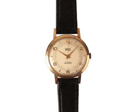 SMITHS EVEREST: A GENTLEMAN'S 9CT GOLD WRISTWATCHthe white dial with gold Arabic and baton numerals and hands, red arrow seco