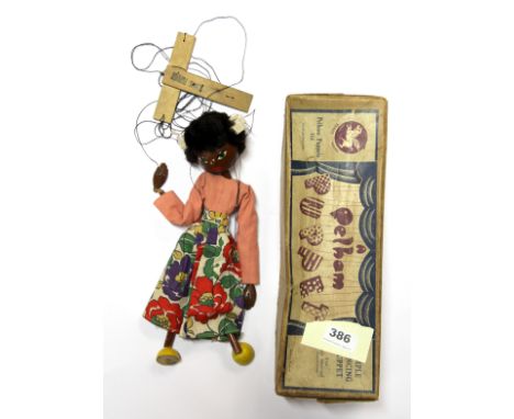 A vintage black doll Pelham Puppet.